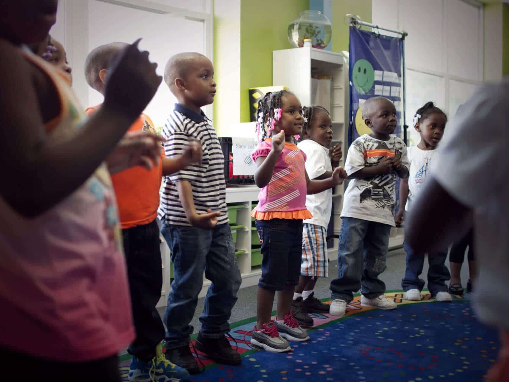 students in a circle doing an activity at Breakthrough Beginners preschool